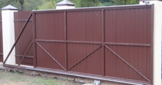 Купить откатные ворота из профнастила Дальнереченск, цена от 1736 руб.
