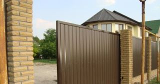 Купить откатные ворота из профнастила Дальнереченск, цена от 1736 руб.